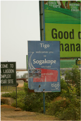 Visitors to Sogakope are welcomed by Tigo, one of Ghana’s three major cell phone carriers and the operator of the country’s biggest mobile money system.