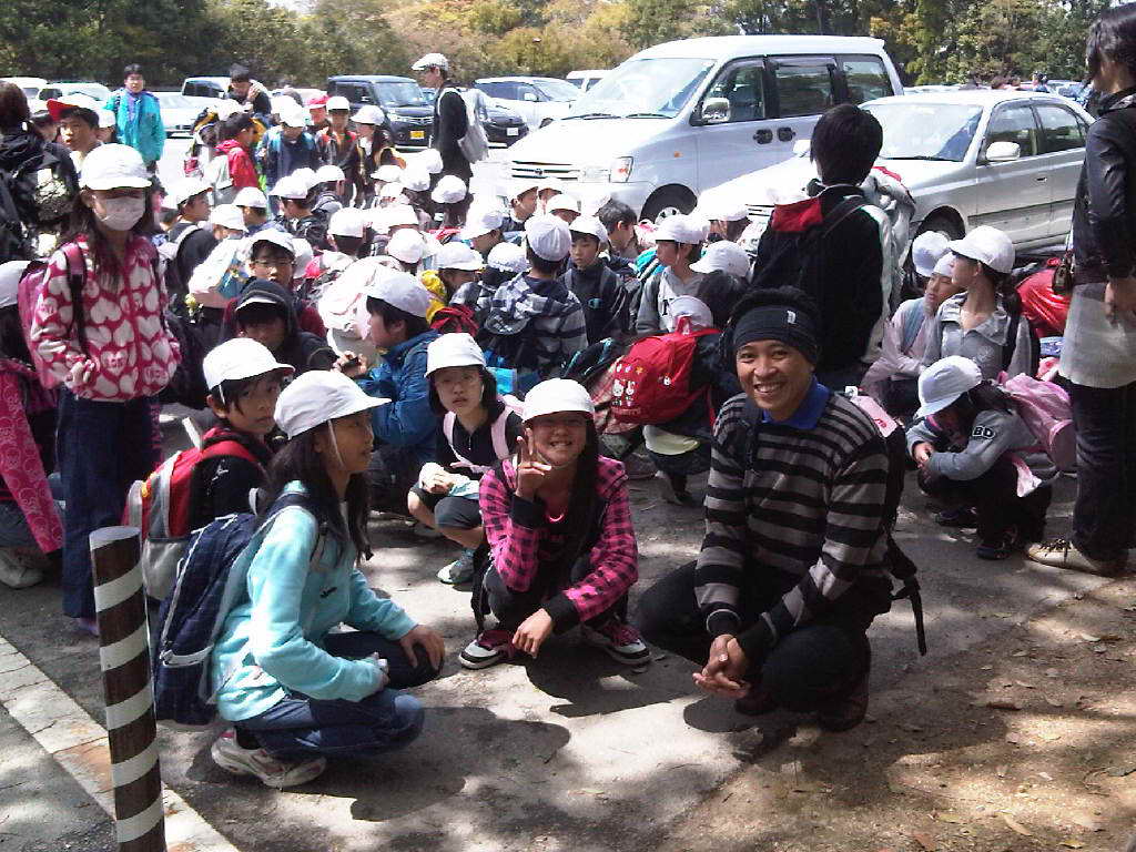 Me on the right and the smiling students during my visit to Osaka.